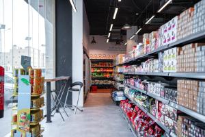 a store aisle with a lot of soda cans at Paradise of North Riyadh جنة شمال الرياض in Riyadh