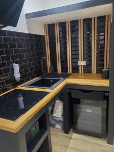 Kuchyň nebo kuchyňský kout v ubytování Chambre d'Hôte Straboni