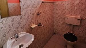 חדר רחצה ב-Hotel Rishiraj