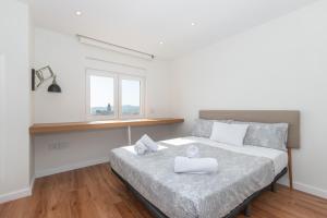 Łóżko lub łóżka w pokoju w obiekcie Luxury beach/port apartment
