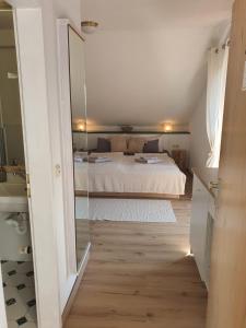 Ένα ή περισσότερα κρεβάτια σε δωμάτιο στο Apartment Bavaria