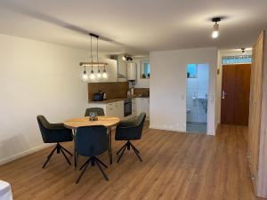 Kuchyň nebo kuchyňský kout v ubytování Apartment Bergpanorama mit wunderschönem Alpenpanorama und Indoor-Pool