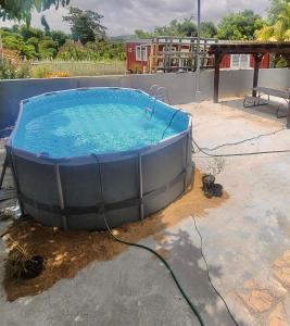 a hot tub sitting on top of a patio at Mayaguez Spacious 3 bedroom villa in Mayaguez
