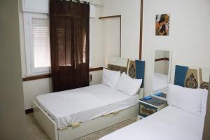 Cama o camas de una habitación en cairo view hotel