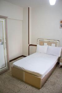 Cama o camas de una habitación en cairo view hotel