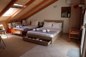 A bed or beds in a room at AB Preveza Apartments -15 Meters Over the Sea