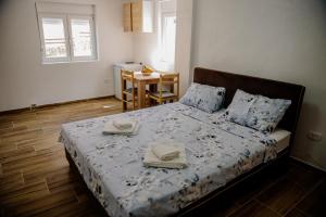Postel nebo postele na pokoji v ubytování Premium Apartments