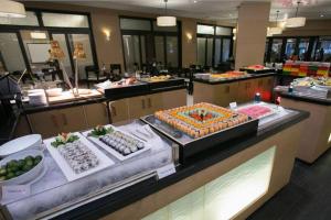 a buffet line with many different types of food at 2 Bedroom Condo in Cebu - opp Ayala in Cebu City