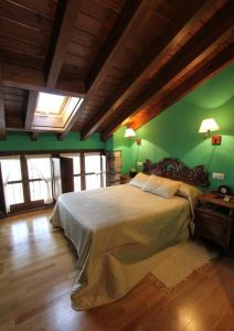 A bed or beds in a room at La Quintana Sinariega