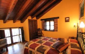 A bed or beds in a room at La Quintana Sinariega