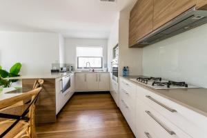 A kitchen or kitchenette at Sandcastle