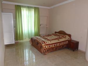Postel nebo postele na pokoji v ubytování Guest House Vitali