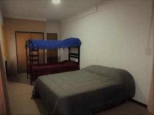 Postel nebo postele na pokoji v ubytování HOSTEL ARRAYAN BARILOCHE
