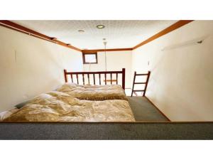 Кровать или кровати в номере Hakuba Pension Meteor - Vacation STAY 63322v