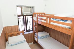 Katil atau katil-katil dalam bilik di Ah Shan Hostel