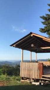 a wooden pavilion on top of a hill at Şirin Villa in Macka