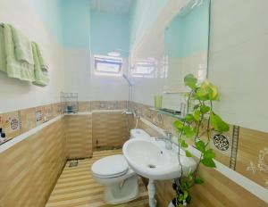 Ванная комната в Laoxao Homestay
