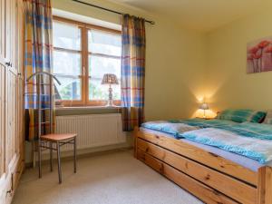 Comfortable holiday apartment in St Peter Ording tesisinde bir odada yatak veya yataklar