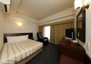 Μια τηλεόραση ή/και κέντρο ψυχαγωγίας στο Hotel Blion Naha