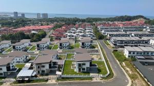an aerial view of a residential suburb at Sandakan Homestay Coastal Serenity 山海绿栖 in Sandakan