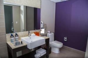 Um banheiro em Megapolis Hotel Panama