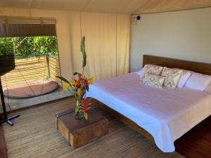 Glamping Las Rocas客房内的一张或多张床位
