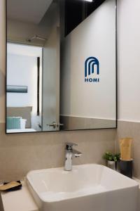 Homi Oasis at KK Times Square 和逸绿洲的一间浴室