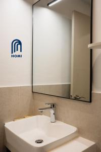 Homi Oasis at KK Times Square 和逸绿洲的一间浴室