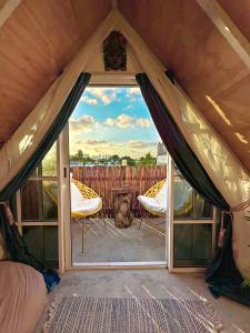 Postel nebo postele na pokoji v ubytování Bungalow Maya en CASA NOMIS CANCUN