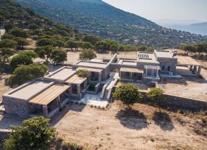 an aerial view of a house on a hill at Pavlaina Complex of Traditional Residences in Nisyros. Enjoy the garden and the Sea View in Emporeiós