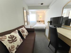 Postel nebo postele na pokoji v ubytování Grand Park Hotel Panex Chiba + 28 fotografií