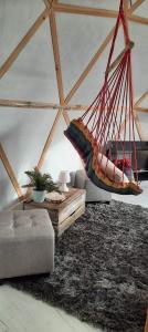 Khu vực ghế ngồi tại Domaine de la Tuilière - le dôme insolite avec balneo privative