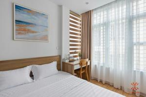 Giường trong phòng chung tại NB APARTMENT-LINH LANG