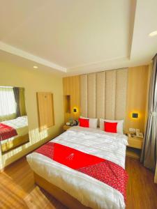 Ένα ή περισσότερα κρεβάτια σε δωμάτιο στο Hotel Aerocity