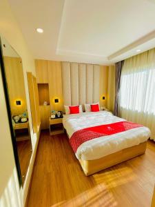 Ένα ή περισσότερα κρεβάτια σε δωμάτιο στο Hotel Aerocity