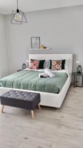 Säng eller sängar i ett rum på Volturno3 Suites & more