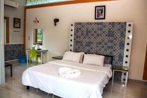 Postel nebo postele na pokoji v ubytování Yoko River Kwai Resort + 147 fotografií