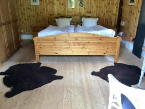 Postel nebo postele na pokoji v ubytování Hinnedal ,på Ryssberget