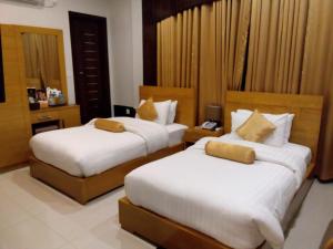 Krevet ili kreveti u jedinici u okviru objekta Burj Al Swat Hotel