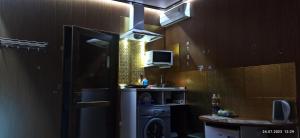 Dapur atau dapur kecil di Apartment in a guest house