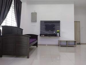 Predel za sedenje v nastanitvi 3 airconditioned bedroom in Muar Town