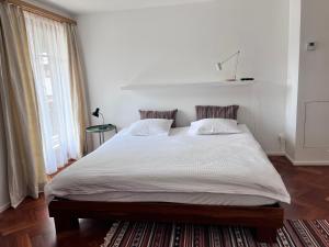 apartment Alpenrose客房内的一张或多张床位