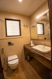 Koupelna v ubytování Hotel Grand Sabarees