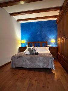 A bed or beds in a room at Apartaments Arenys De Boi