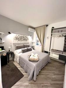 Postel nebo postele na pokoji v ubytování Spagna Rooms + 14 fotografií