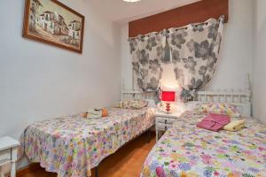 Posteľ alebo postele v izbe v ubytovaní Epsilon 2 4f primera línea de playa + 24 fotografií