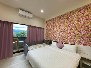 Voodi või voodid majutusasutuse WanTon B&B toas