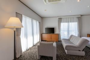 A television and/or entertainment centre at Suikouen Hotel