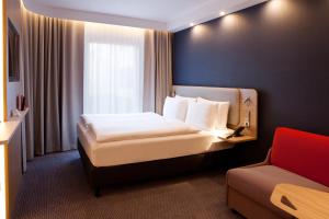 Postel nebo postele na pokoji v ubytování Holiday Inn Express Bochum by IHG + 37 fotografií