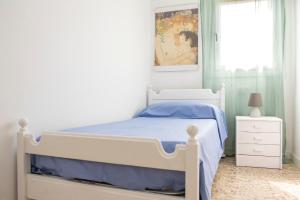 Posteľ alebo postele v izbe v ubytovaní Apartamento Málaga El Faro